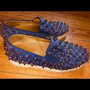 CHRISTIAN LOUBOUTIN studded red-bottom sneakers